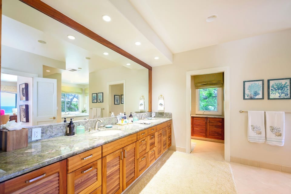 Master bathroom with double sinks, make up table, seperate smart toilet and  tub