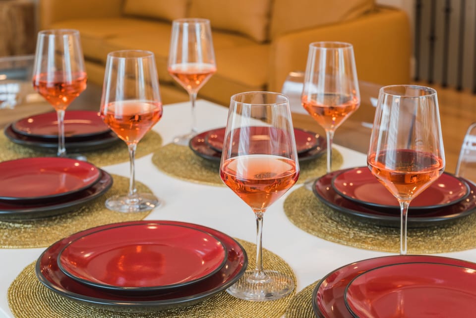 Host a family dinner at the dining table that seats 6.