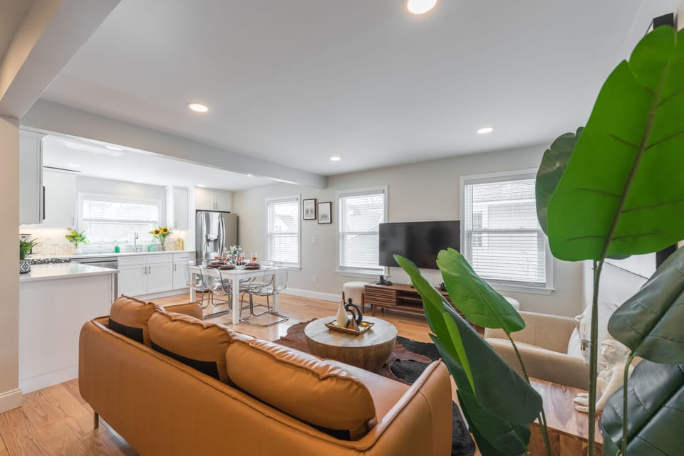 Greenery, decorations, and art liven up the space.