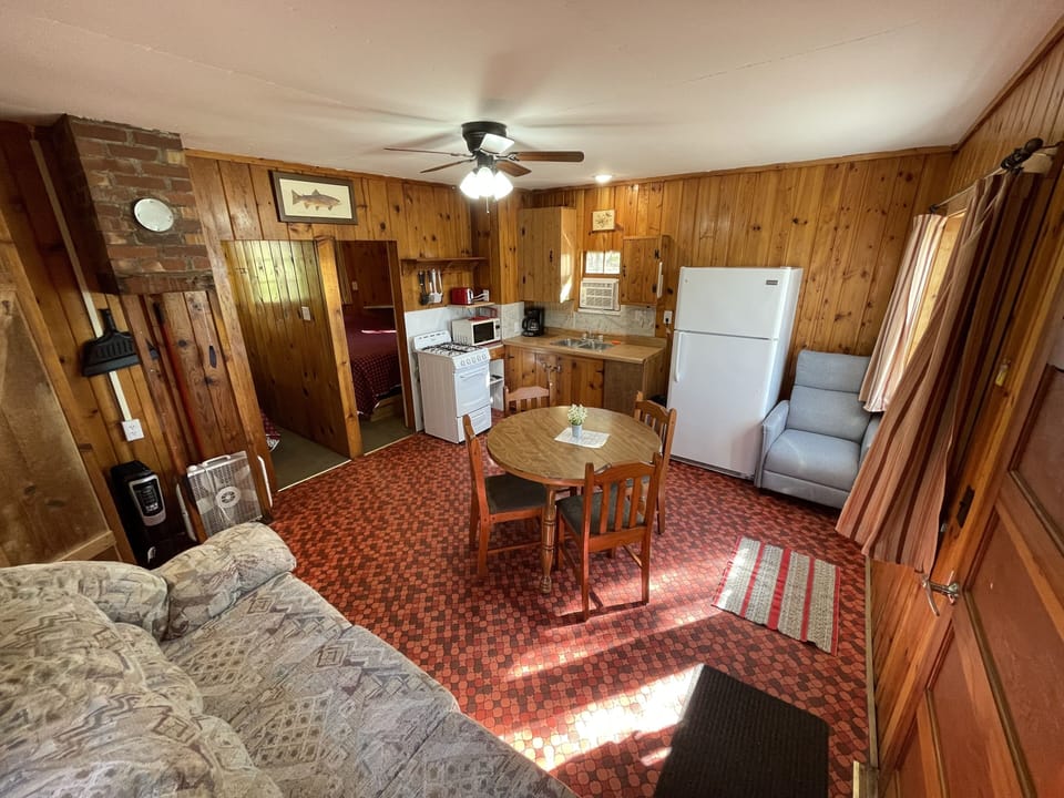 Cabin 2's combined kitchen/dining/living area