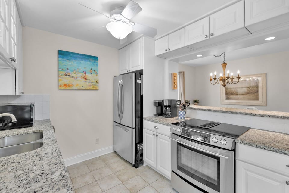 Fully stocked kitchen with stainless steel appliances