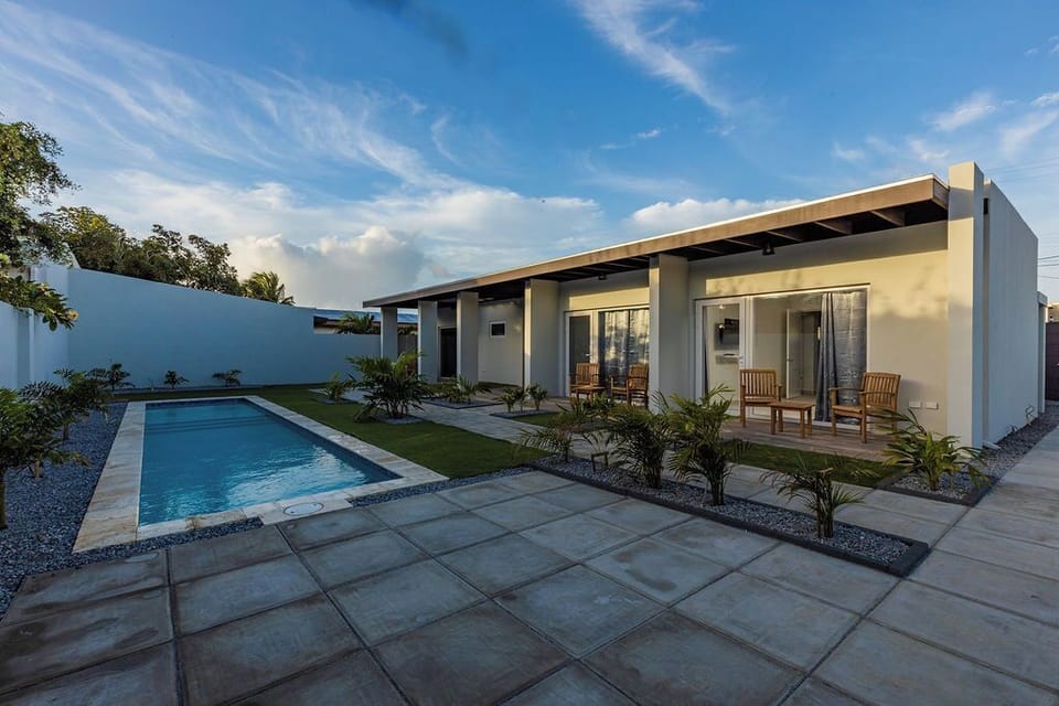 This is a NEW modern one bedroom apartment in a small private complex with four apartments in an amazing location. 
There is a shared pool and laundry area, great WiFi and air conditioning throughout, and control for each area.