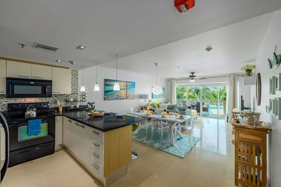 A complete kitchen with a bar.