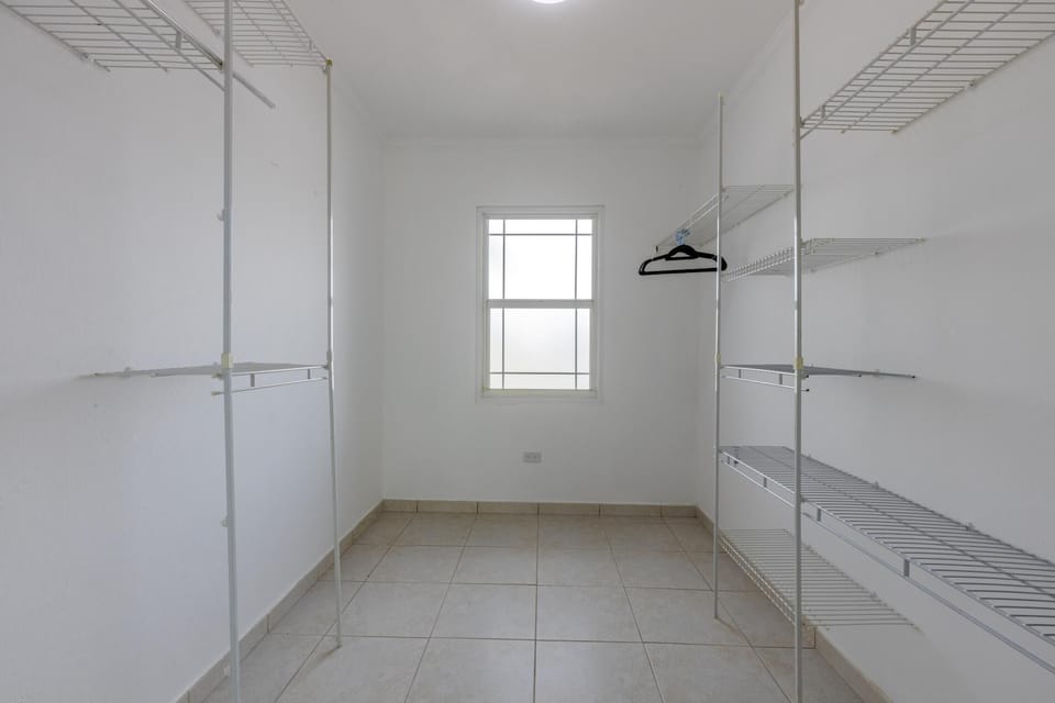 To keep your clothing organized, there is a storage space available