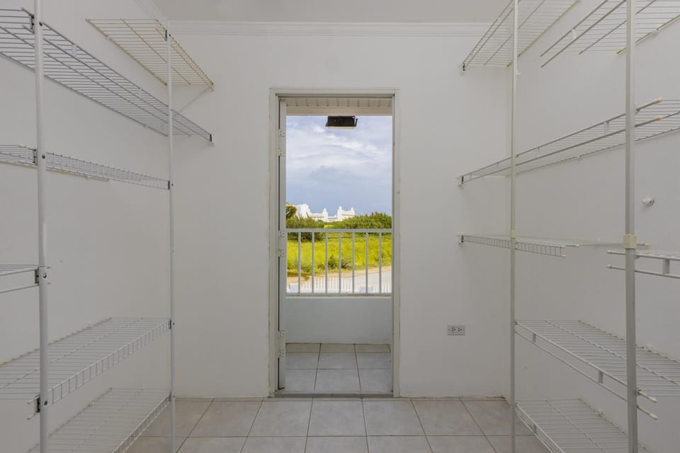 To keep your clothing organized, there is a storage space available.