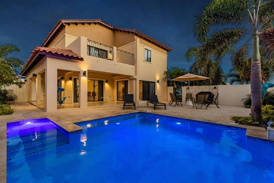 The pool lighting creates a calming and relaxing mood after sunset