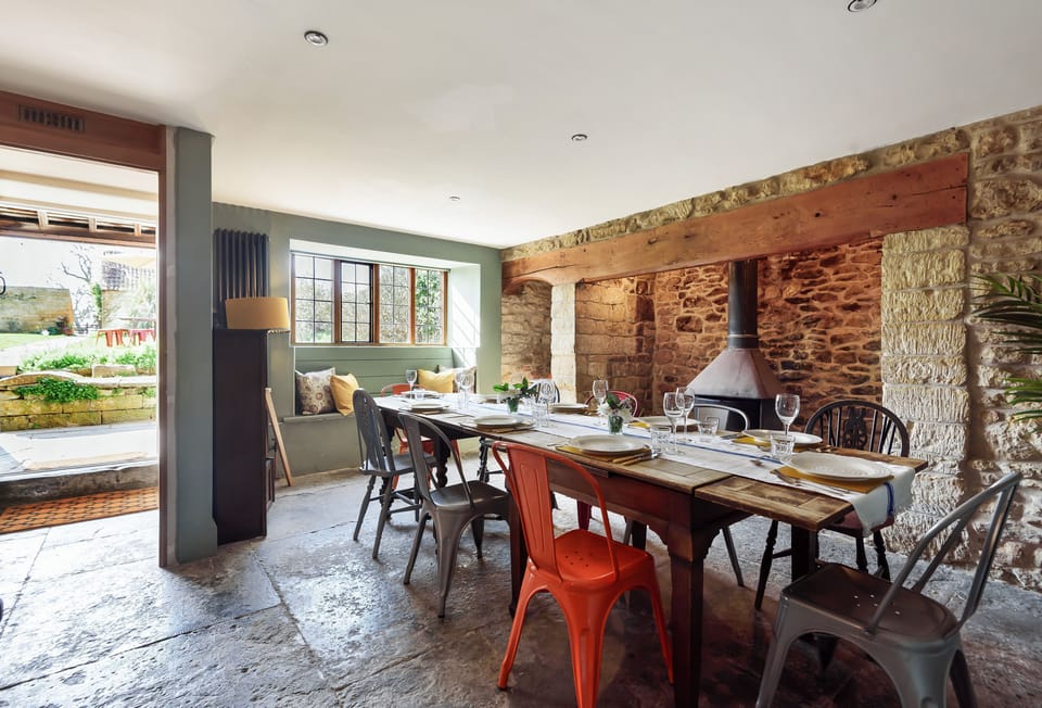 Lower Farm, Sherborne: Dining room with wood burning stove
