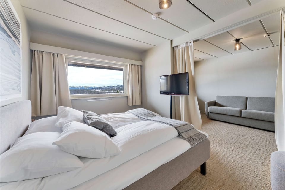 Junior Suite, 1 Queen Bed, Non Smoking, Sea View (with Sofabed) | Desk, soundproofing, iron/ironing board, travel crib