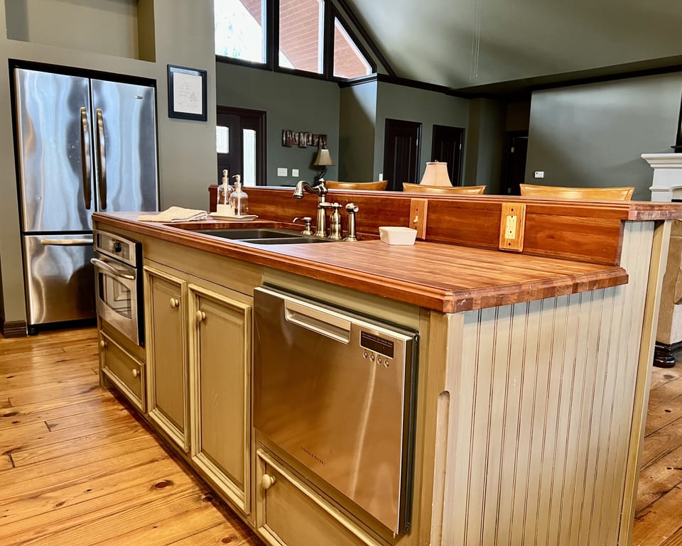 Kitchen island with bar seating. CONVECTION oven, and dishwasher
