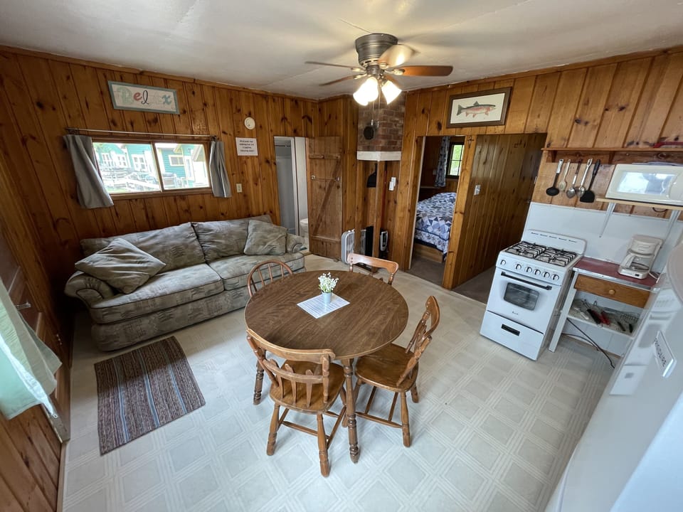 Cabin 5's combined kitchen/dining/living area