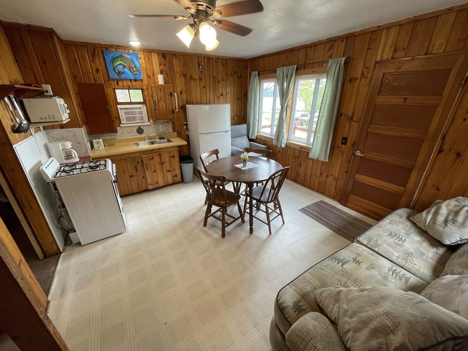 Cabin 5's combined kitchen/dining/living area