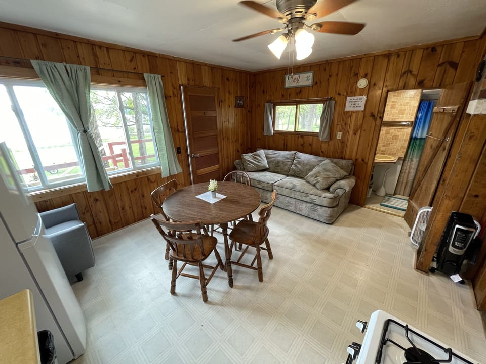 Cabin 5's combined kitchen/dining/living area