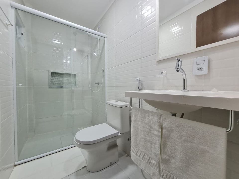 Shower, rainfall showerhead, towels, soap
