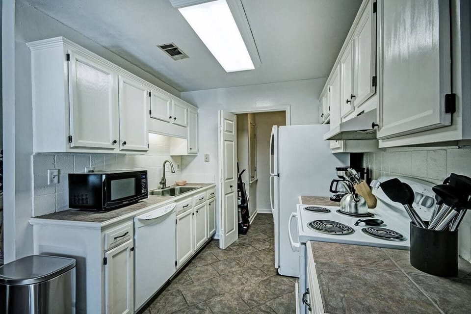 Looking into the kitchen and laundry room.