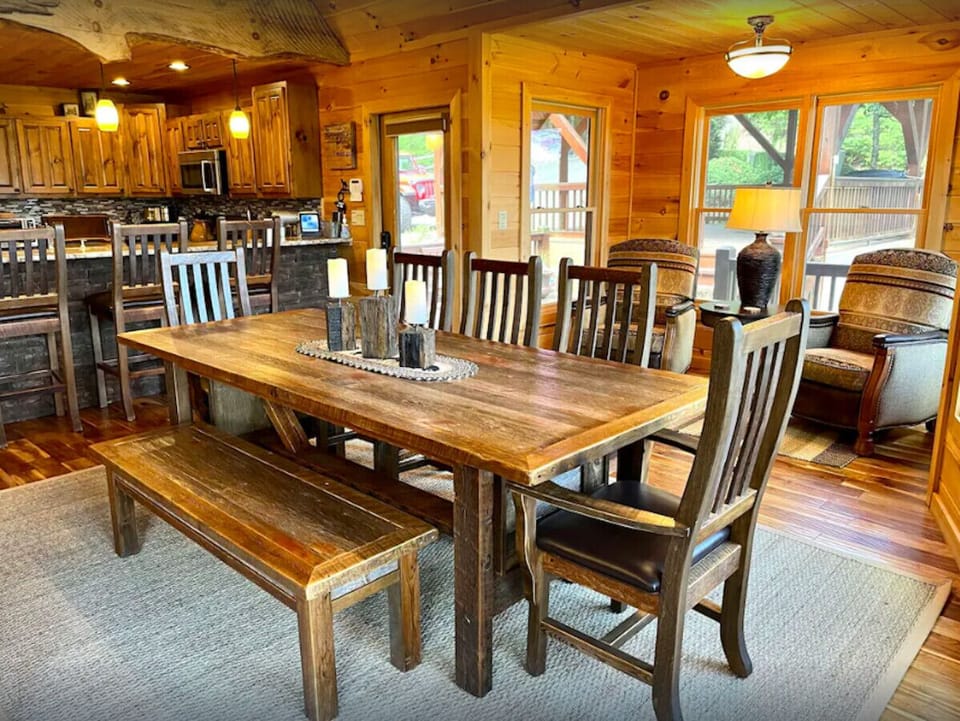 New upscale dining room furniture.  Table seating for 8 and 3 high-top chairs
