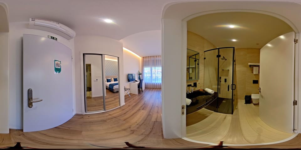 Deluxe Room, 1 King Bed, Accessible, City View | Premium bedding, Select Comfort beds, minibar, individually decorated