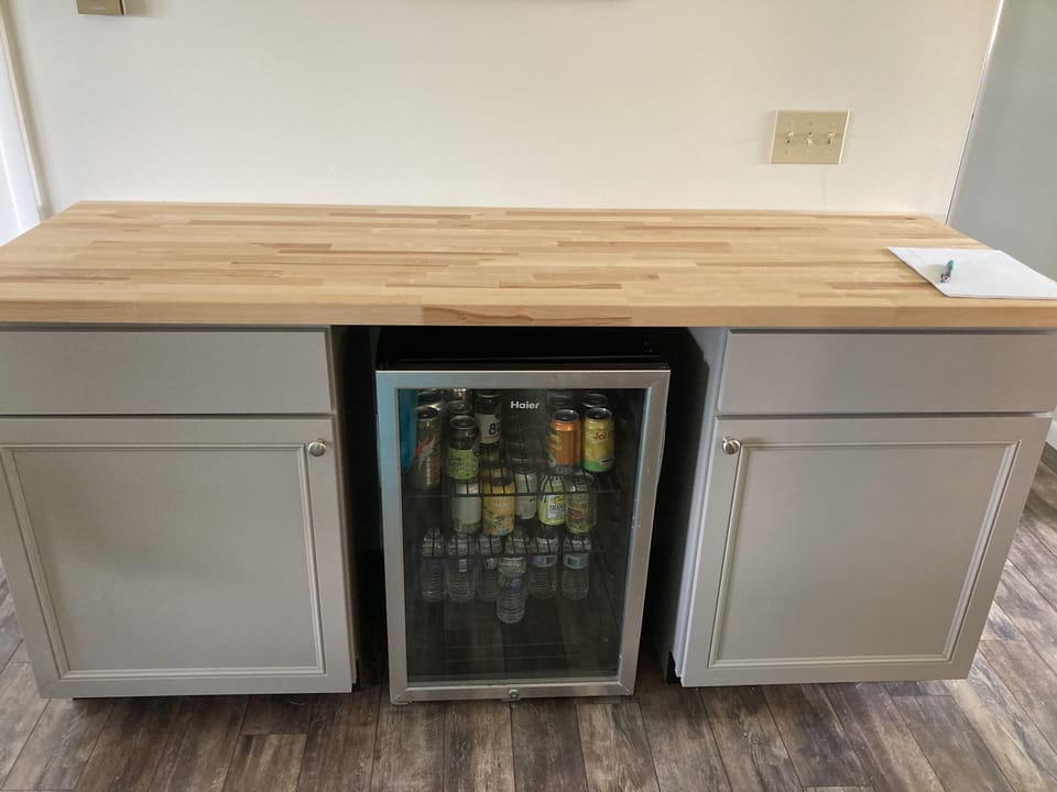 Additional drink refrigerator bar in living room 