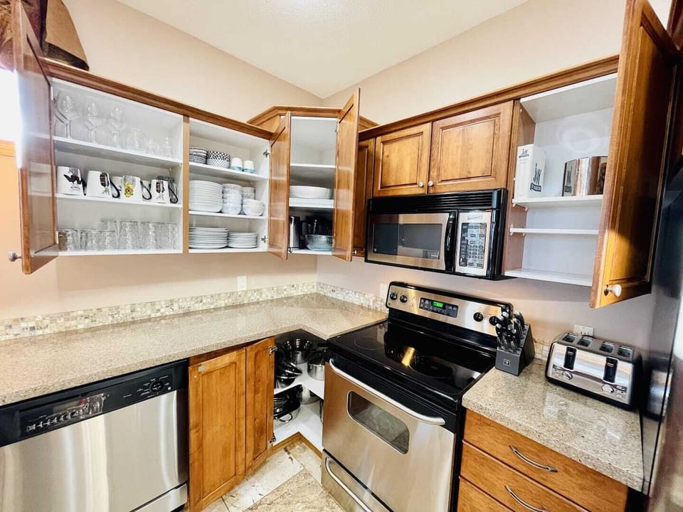 A fully equipped kitchen with everything you'll need to feed and water the troops.  There's always a little something for you on the counter as  a welcome gift plus coffee beans to get you started.