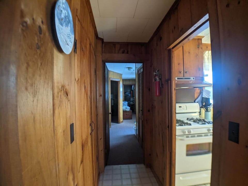 Hall to the Kitchen, Living room and Primary Bedroom