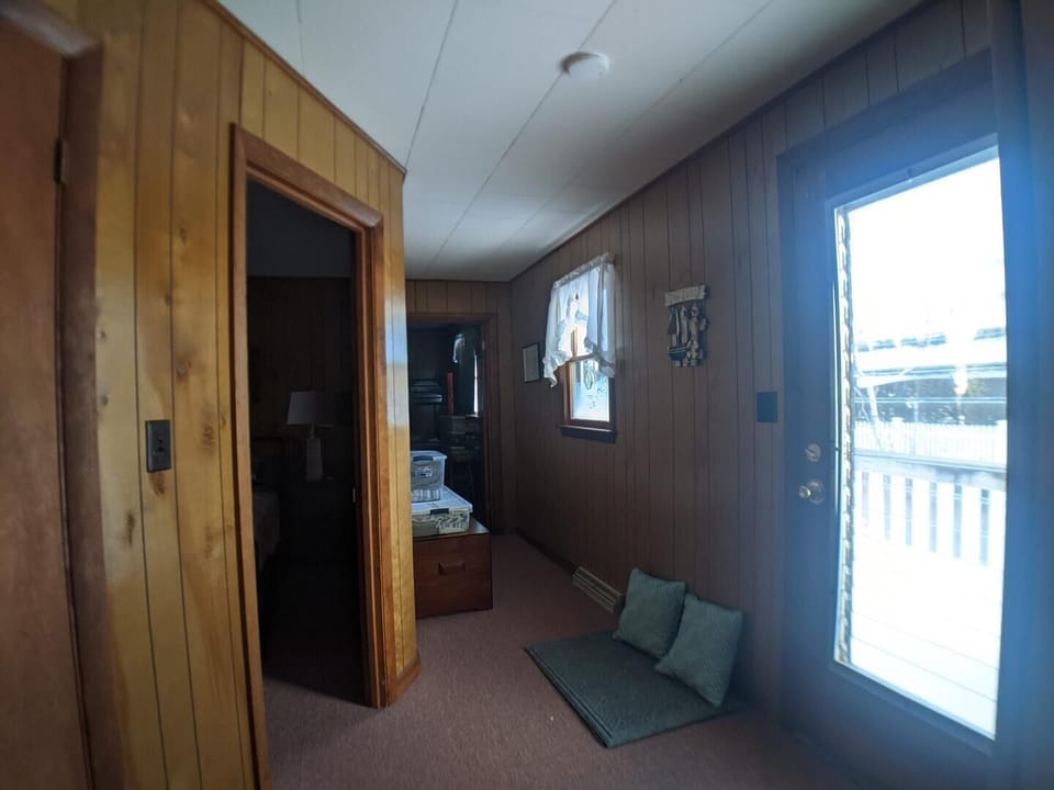Entry way to the home, with a two bedrooms and a bathroom