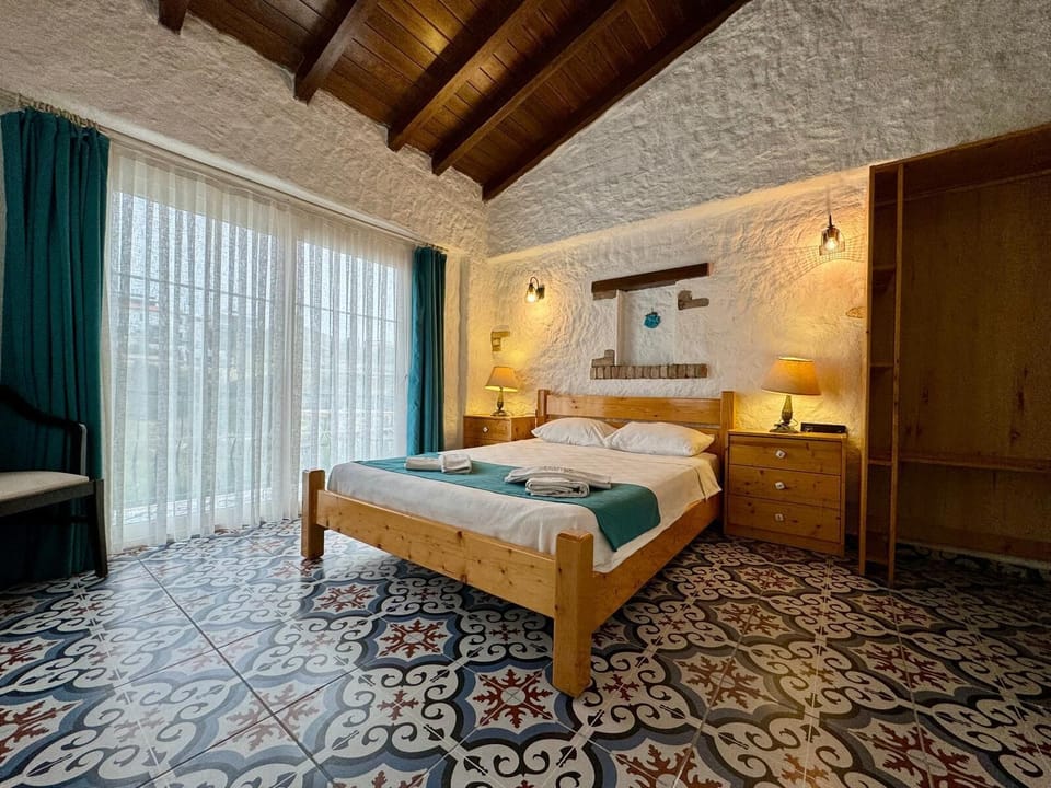 Deluxe Double Room, Non Smoking, Pool View | Frette Italian sheets, premium bedding, minibar, individually decorated
