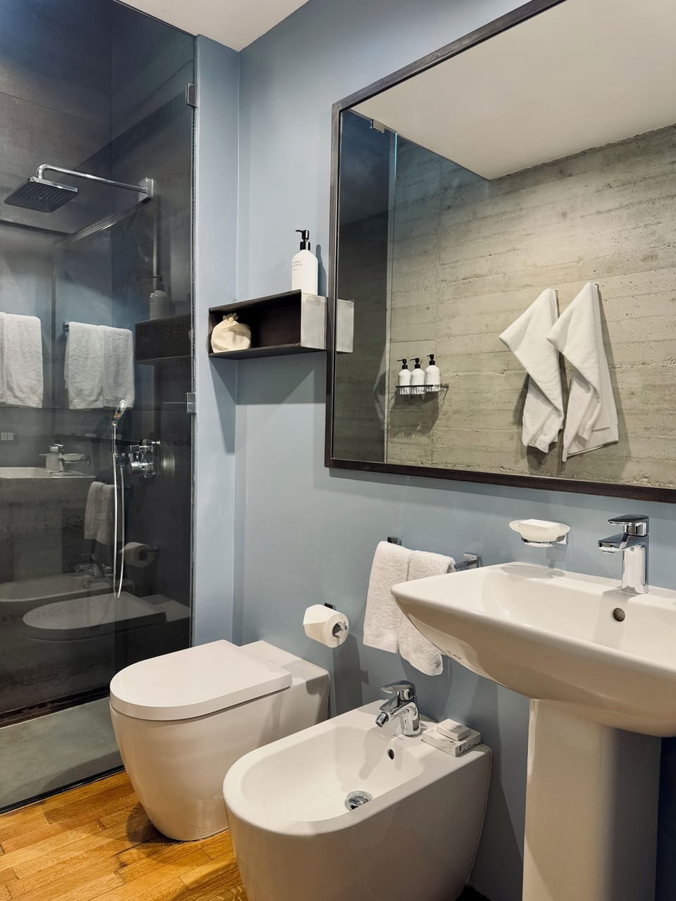 Shower, rainfall showerhead, designer toiletries, hair dryer