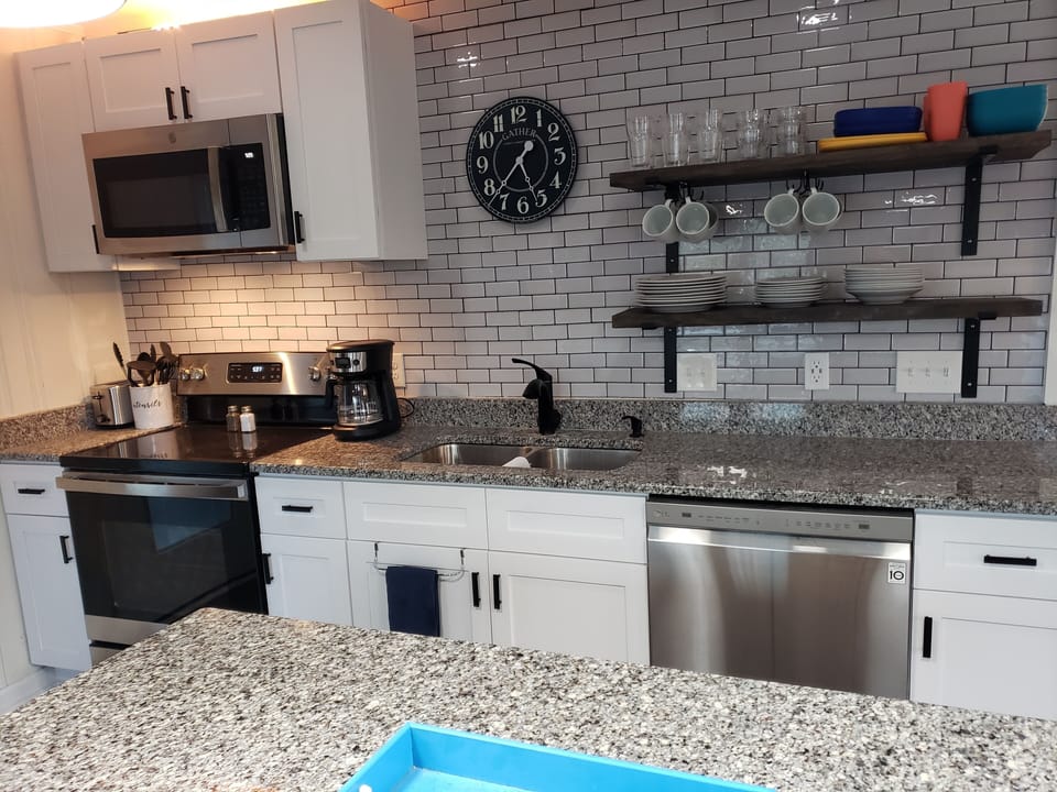 Kitchen - with new micro, oven, stove, ultra-quiet DW and fully stocked