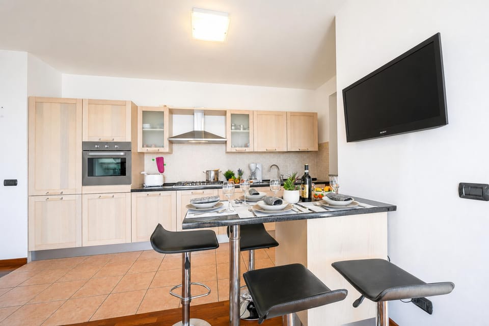 Family Apartment, 2 Bedrooms, 2 Bathrooms, Mountainside (Penthouse The Magnifique View in) | Private kitchen | Stovetop, dining table
