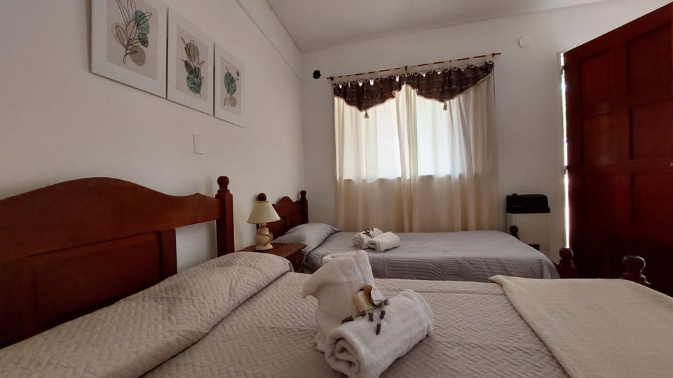 Family Triple Room | Bed sheets