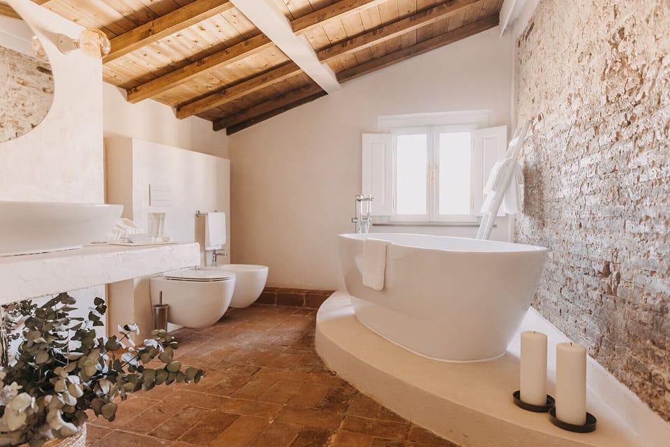 Deluxe Double Room | Bathroom | Designer toiletries, hair dryer, slippers, bidet