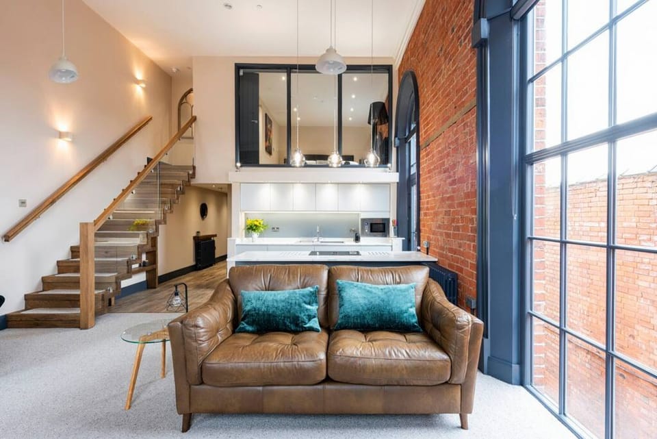 Split over two levels with a stunning oak staircase leading to the mezzanine floor where the sumptuous master bedroom awaits you. Our master suite is complete with a luxuriously fitted bathroom with a bathtub and wet room section with a separate shower, a