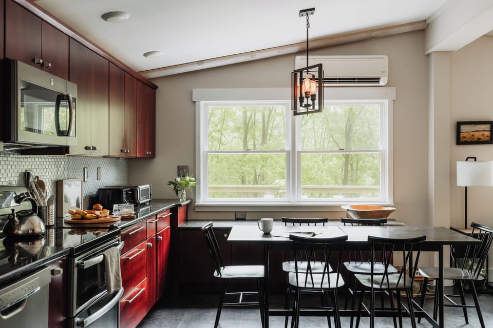 Fully stocked gourmet open plan kitchen seats 6-8. 