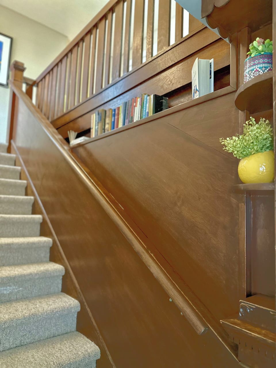Wide carpeted private stairway up to your living space. 