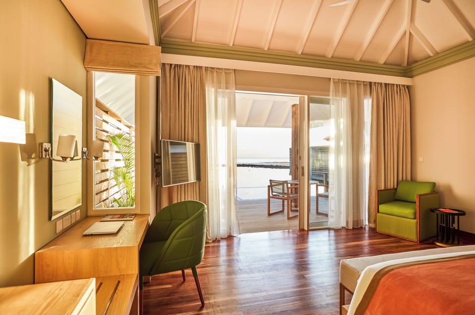 Grand Water Villa with Pool | Minibar, in-room safe, desk, blackout drapes