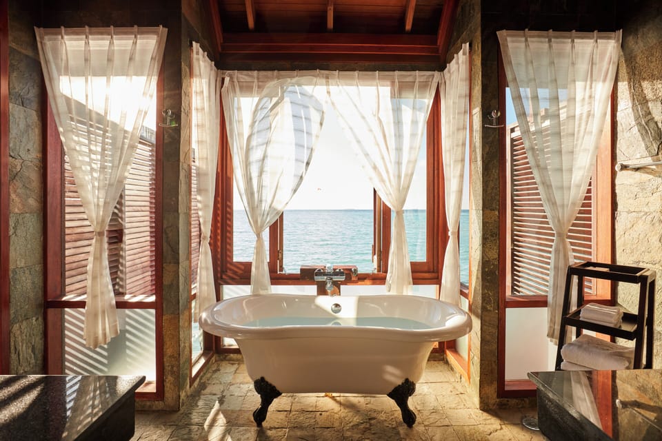 Deluxe Water Villa | Bathroom | Free toiletries, hair dryer, bathrobes, slippers