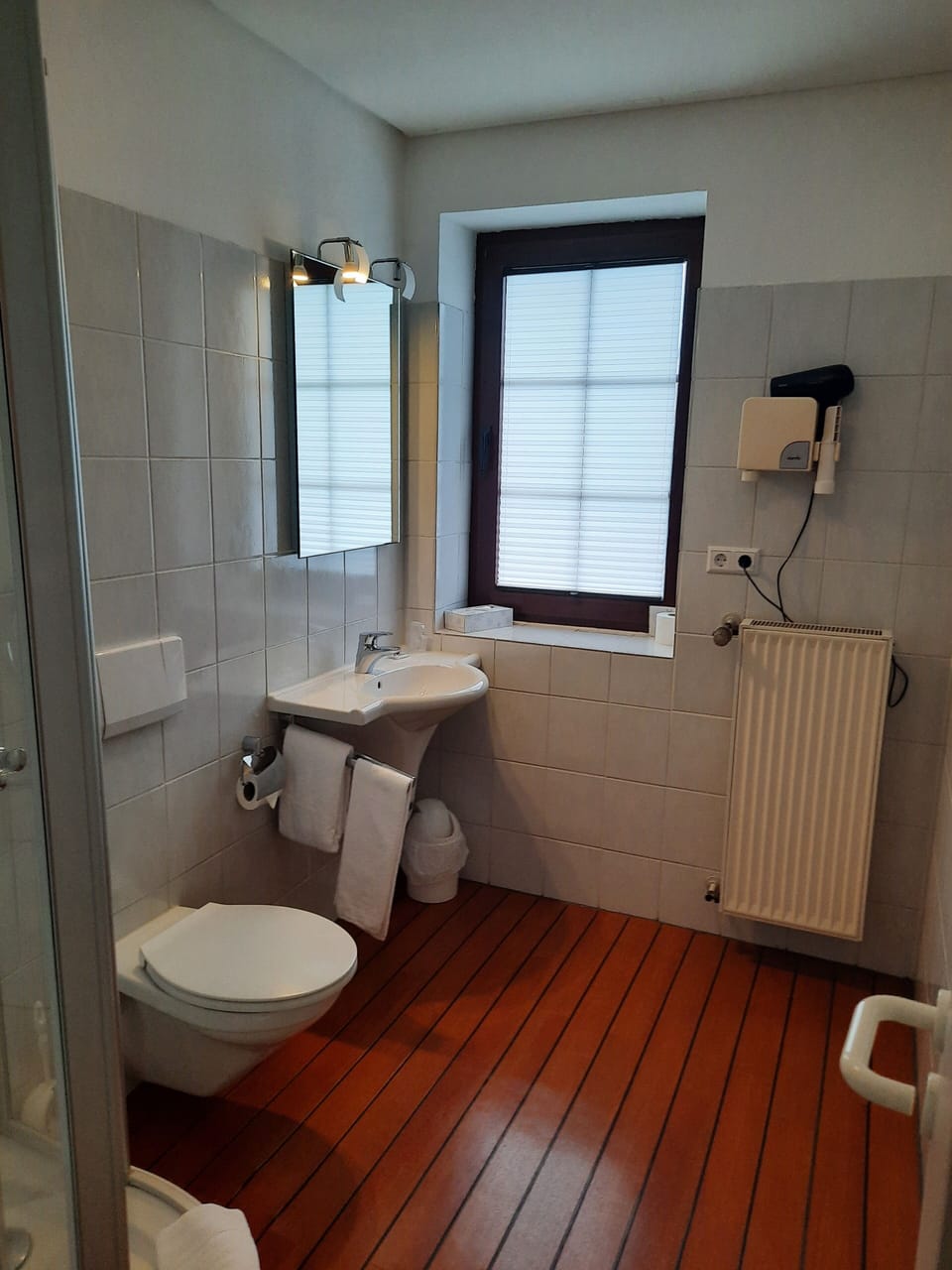 Shower, free toiletries, hair dryer, slippers