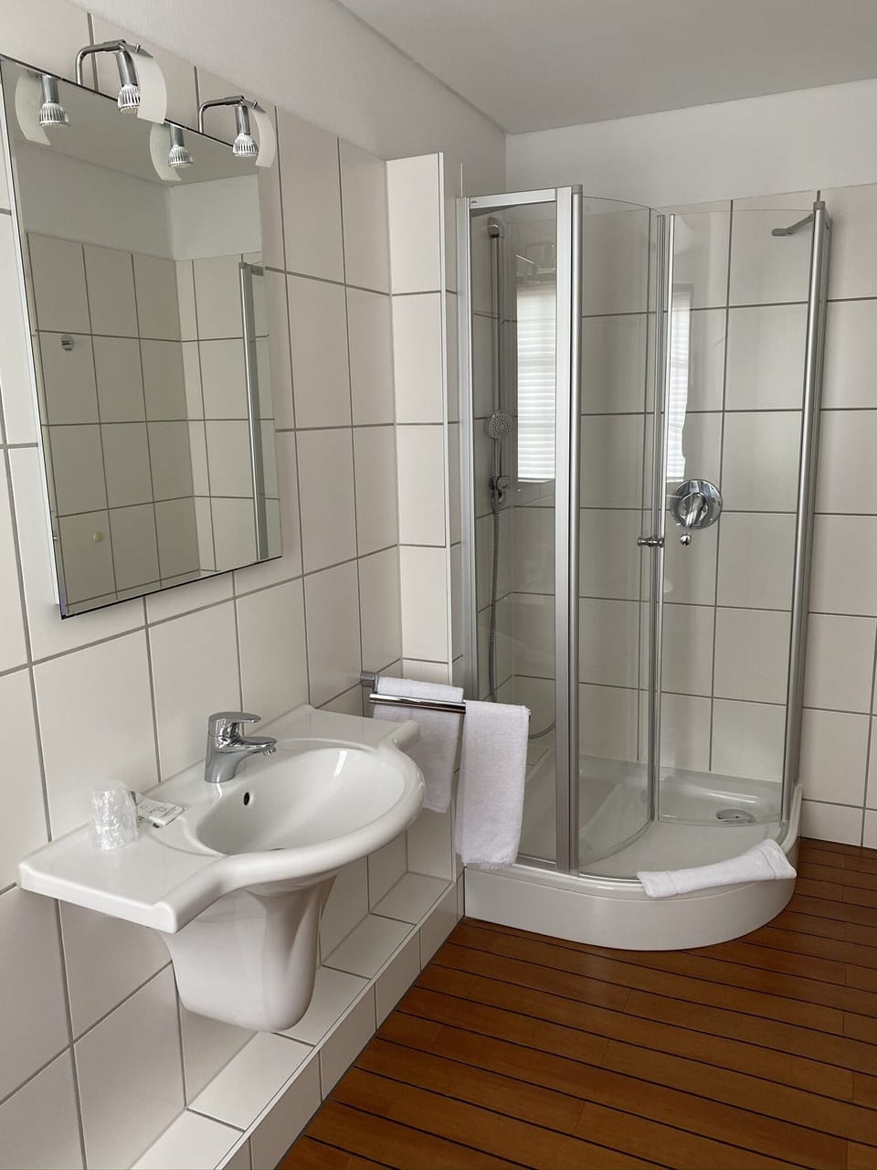 Shower, free toiletries, hair dryer, slippers