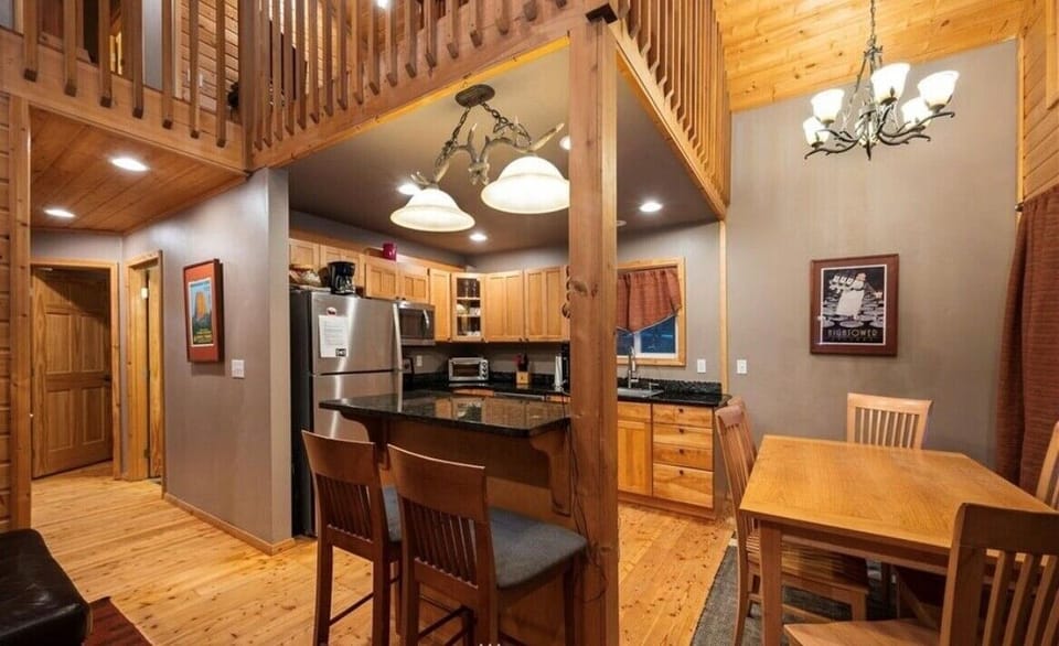 Bar area and dining room. Dining table sits 6 comfortably. 