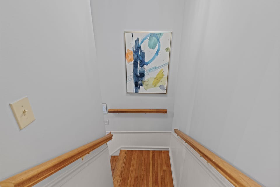 Entrance view from above, 7 steps up into condo, then everything is on one level