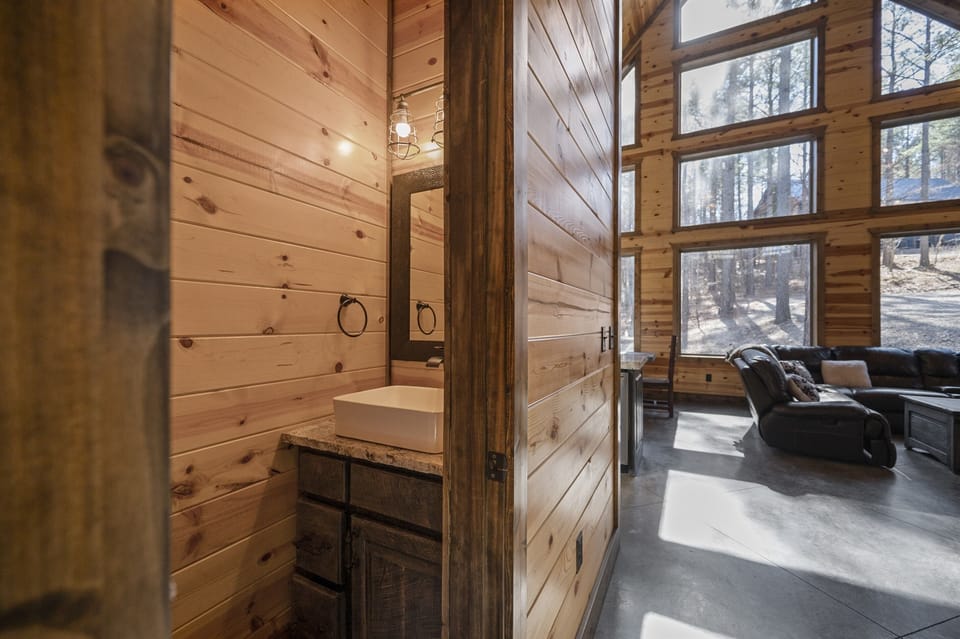 Half bath located downstairs next to kitchen