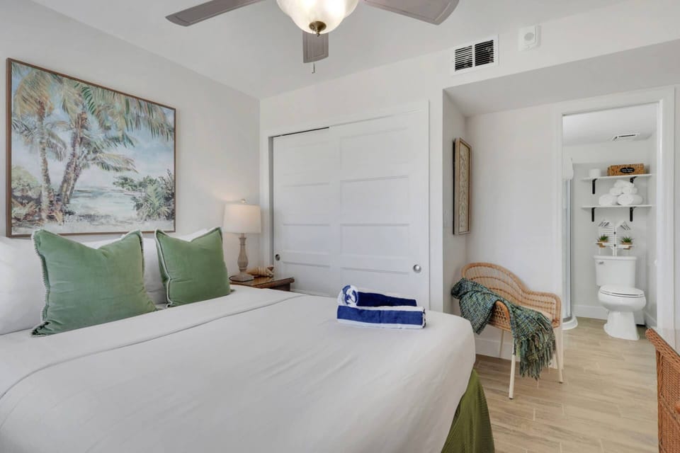 This guest suite enjoys an ensuite bath & spacious closet