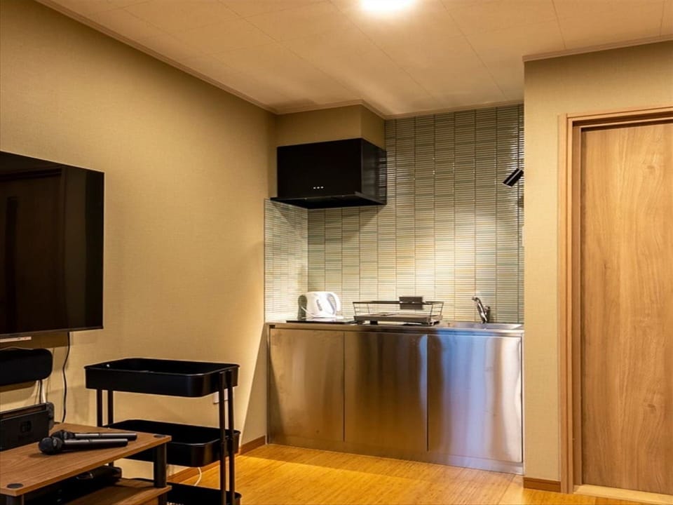 Design House | Private kitchenette | Microwave, stovetop, rice cooker, freezer