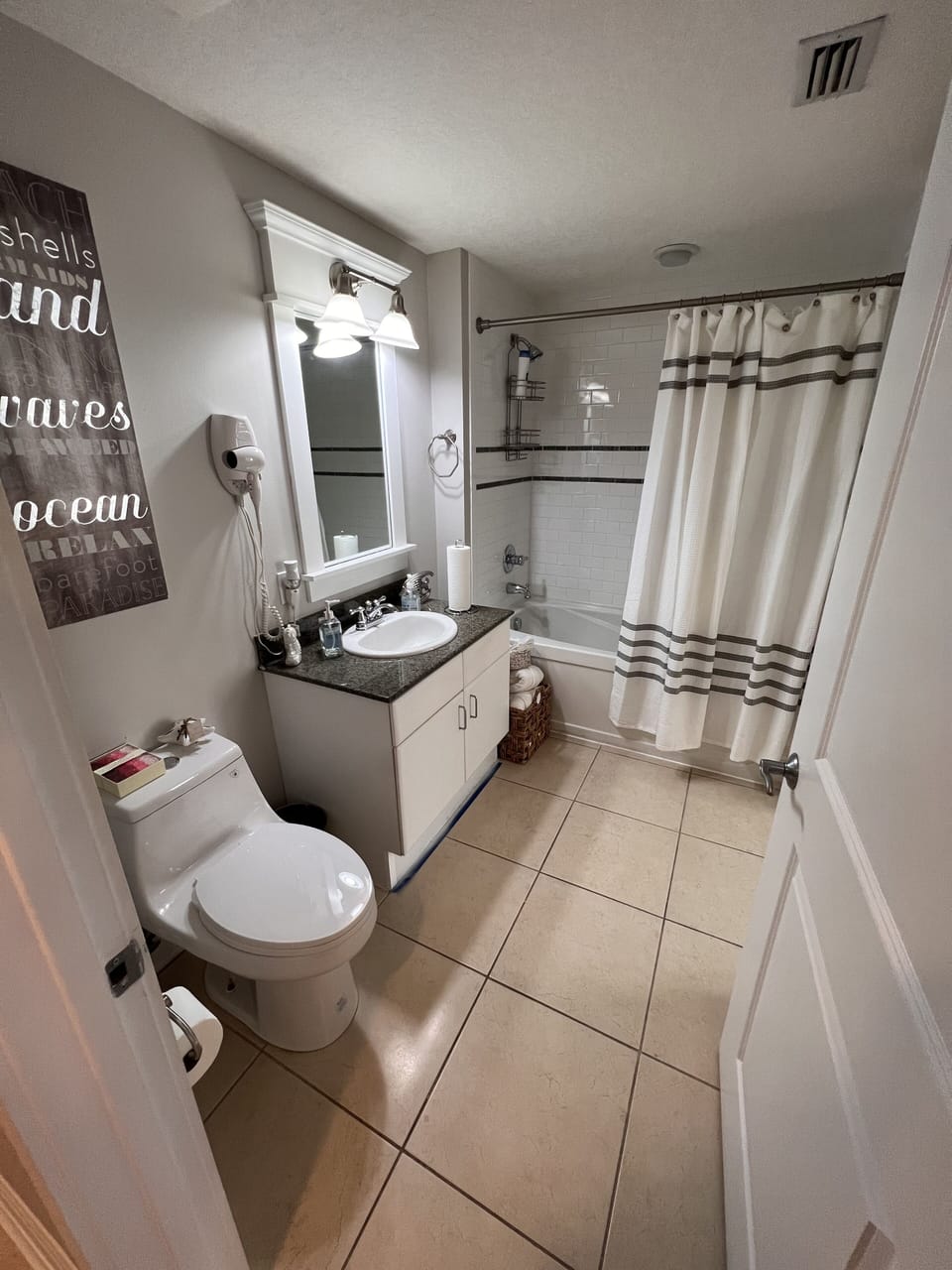 Main Bathroom is accessible from the hall as well as Bedroom 1