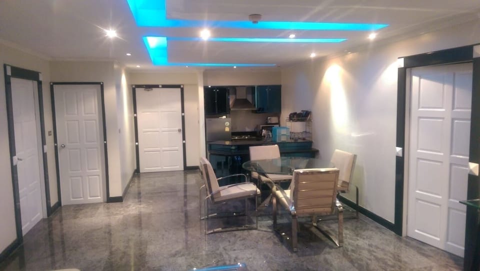 Part view of the Living Room fully marble floor, Air Conditioning, Dual Lighting