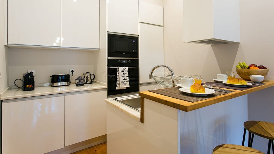 Modern and light kitchenette with all the amenities necessary for your cozy stay #airbnb #cozy #apartment #lisbon #pt #portugal #kitchenette #modern