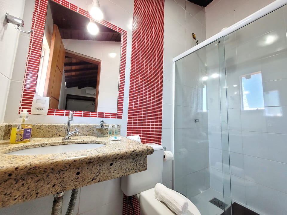 Superior Room | Bathroom | Shower, hair dryer, towels, soap