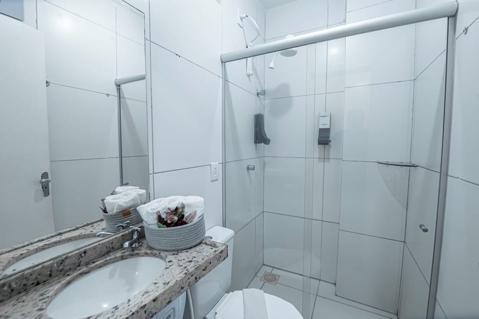 Shower, rainfall showerhead, towels, soap