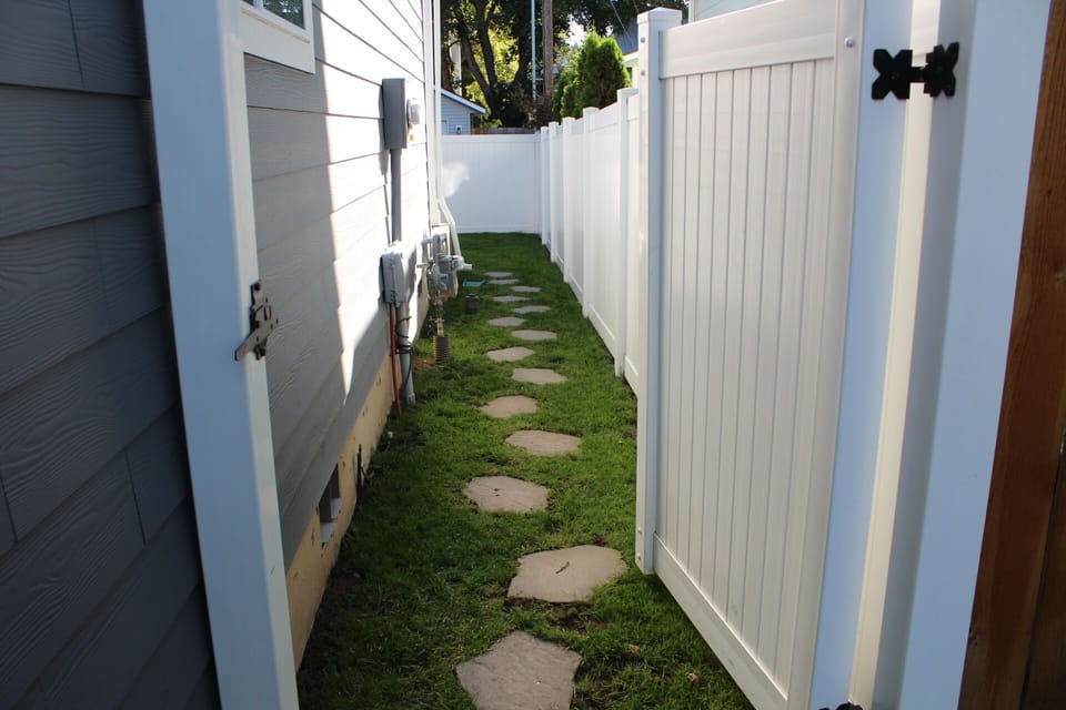 Side entry to back yard & garage