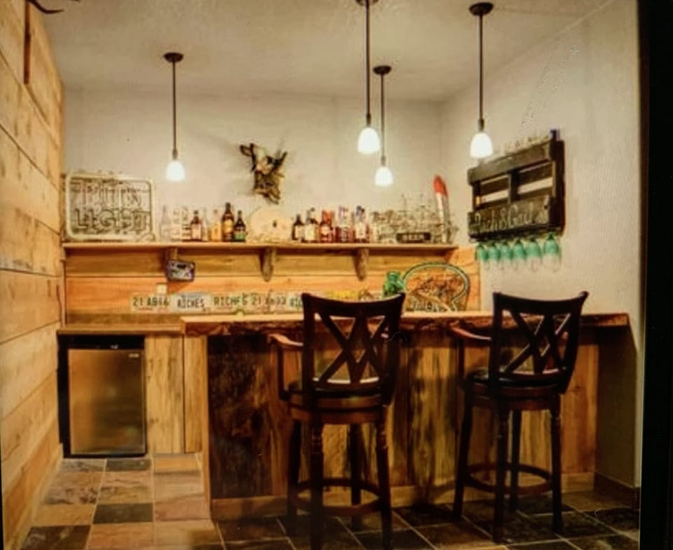 Beautiful custom made pine wood bar for entertaining in the basement area.  