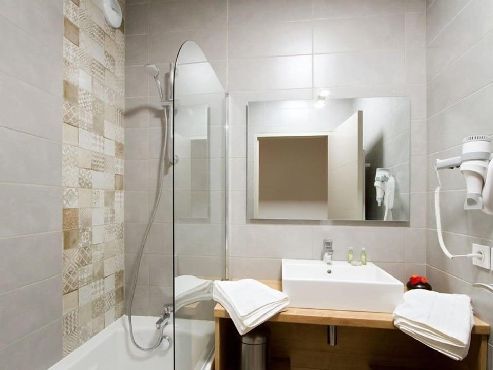 Freshen up in the bathroom after a day of adventure.